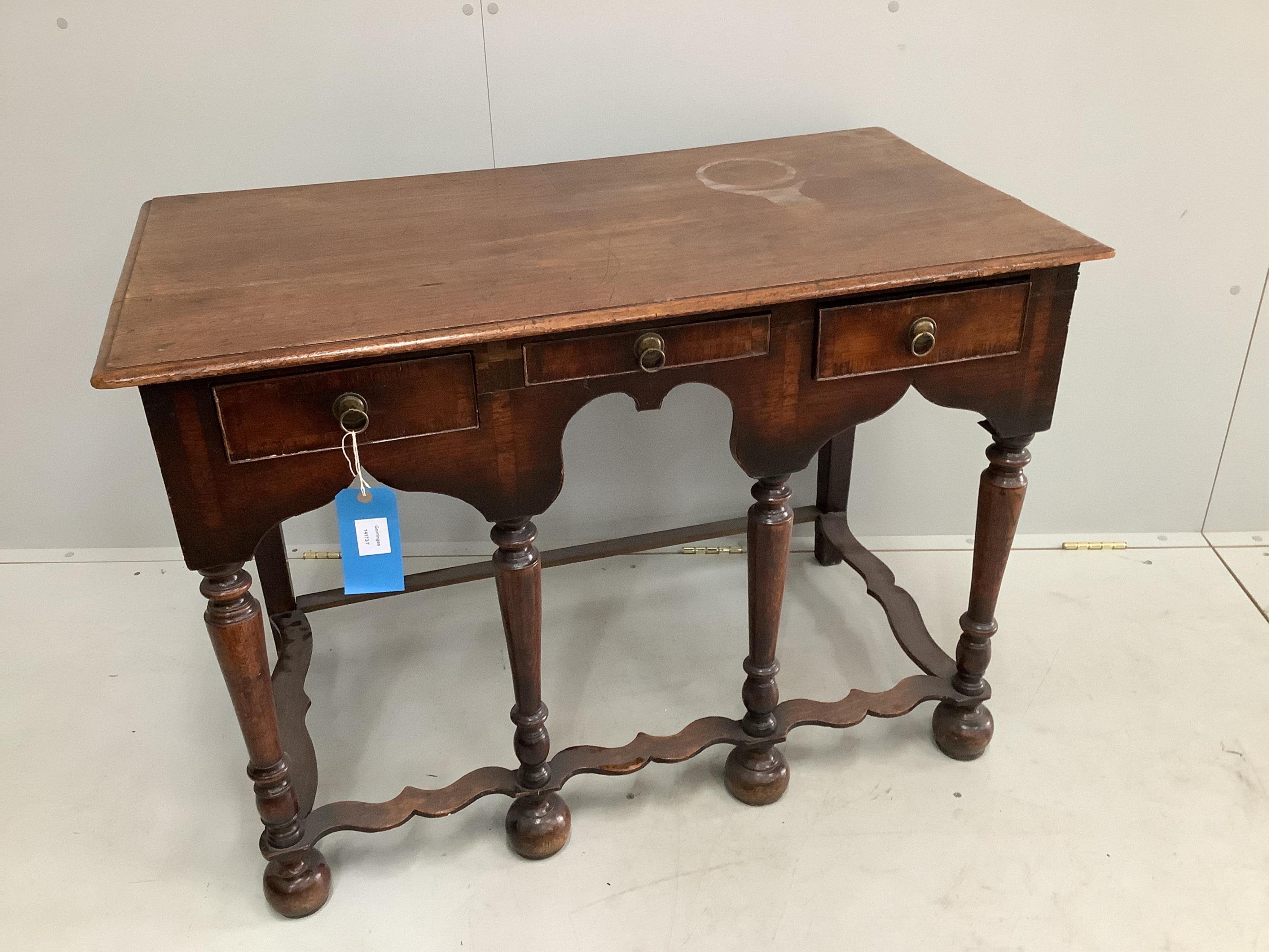 An 18th century and later oak side table, converted from a stand, width 102cm, depth 56cm, height 74cm. Condition - fair